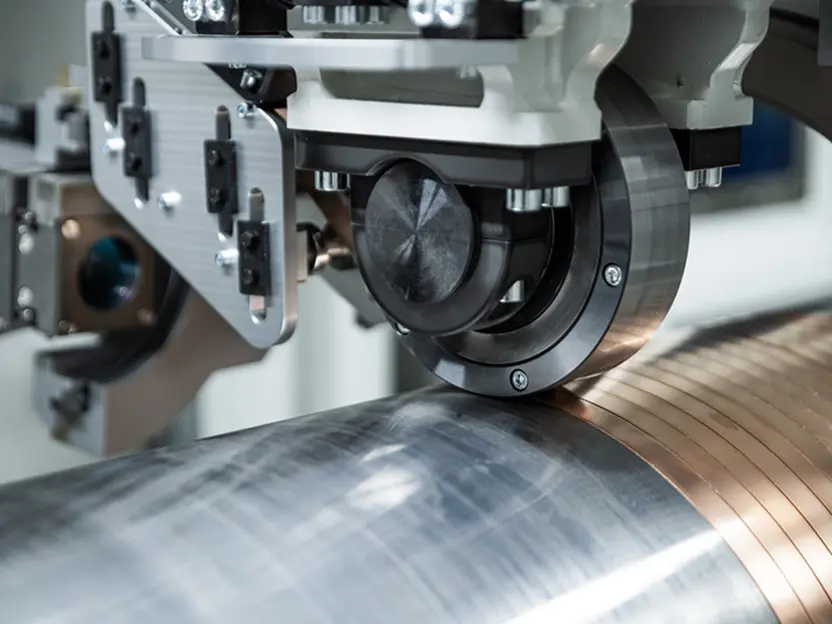 Met het nieuwe ‘Laser Direct Plating’-proces van Fraunhofer IWS wordt een functionele laag spiraalsgewijs aangebracht op het basisonderdeel.